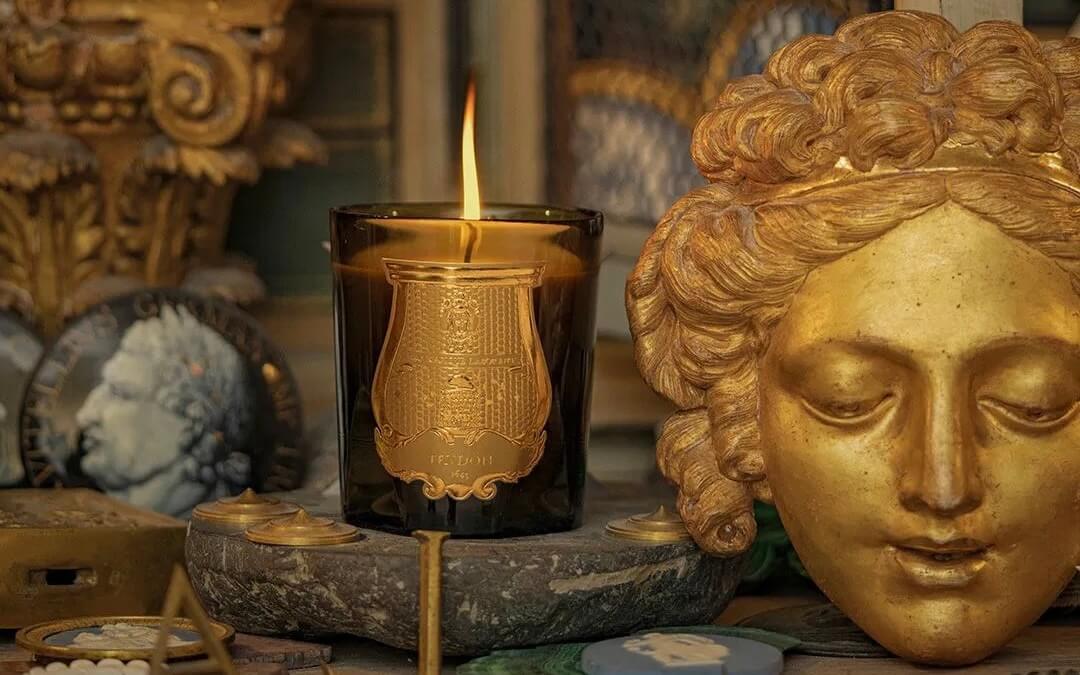 Elegant display of Trudon classic candles and home fragrances in a curated interior setting.